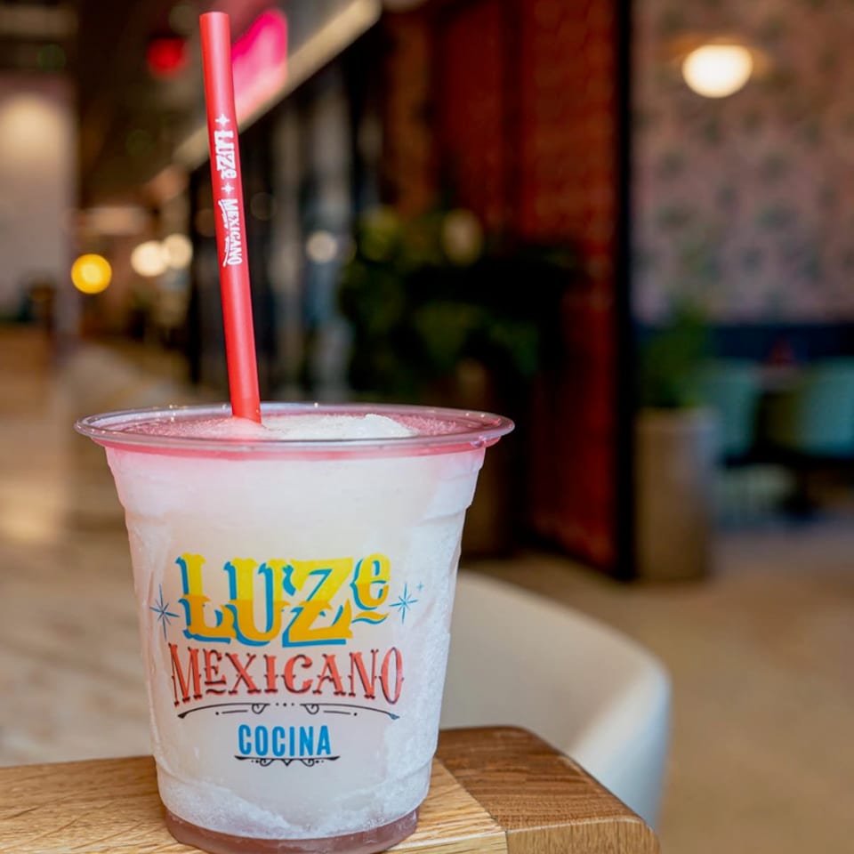 Citrus margarita with chamoy rim in a Luze Mexicano cup