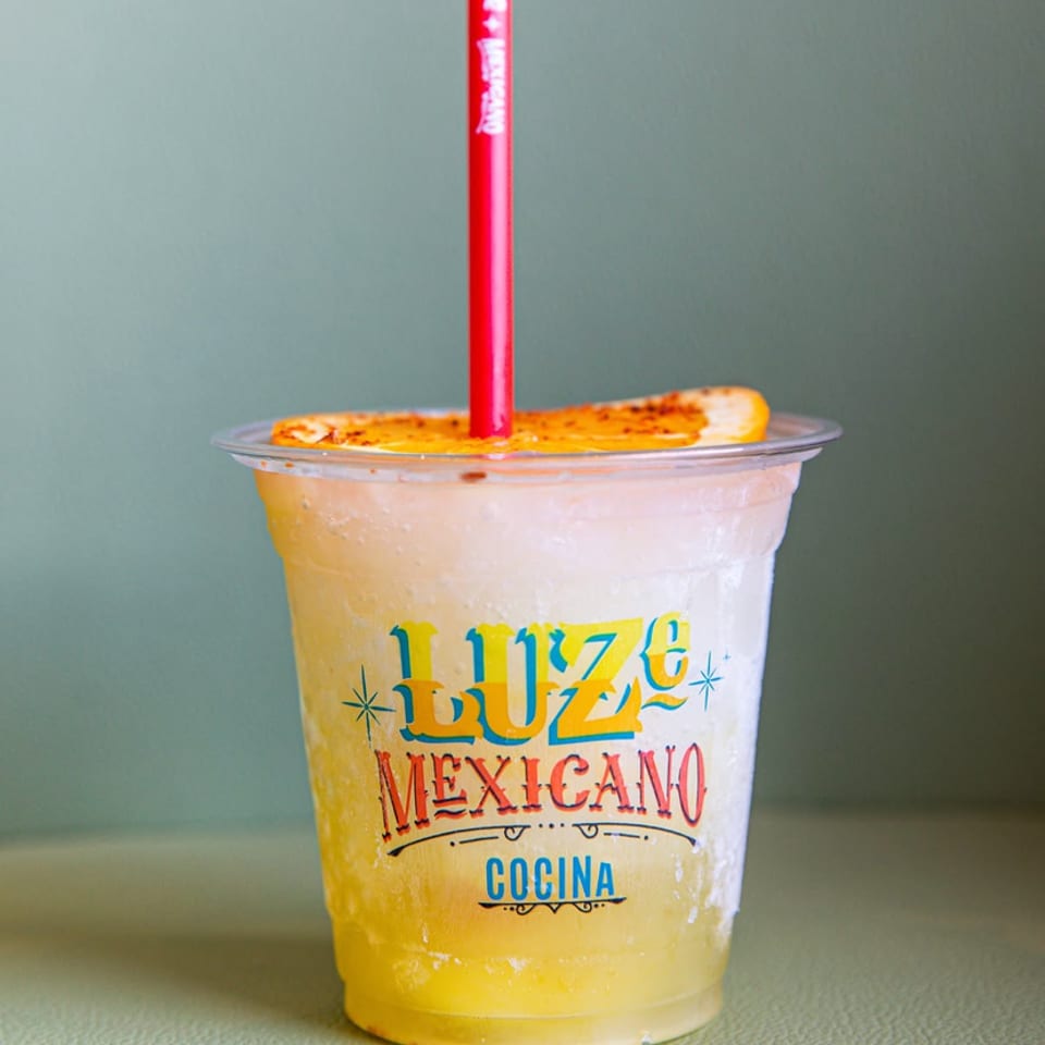 Frozen swirl margarita in a Luze Mexicano cup